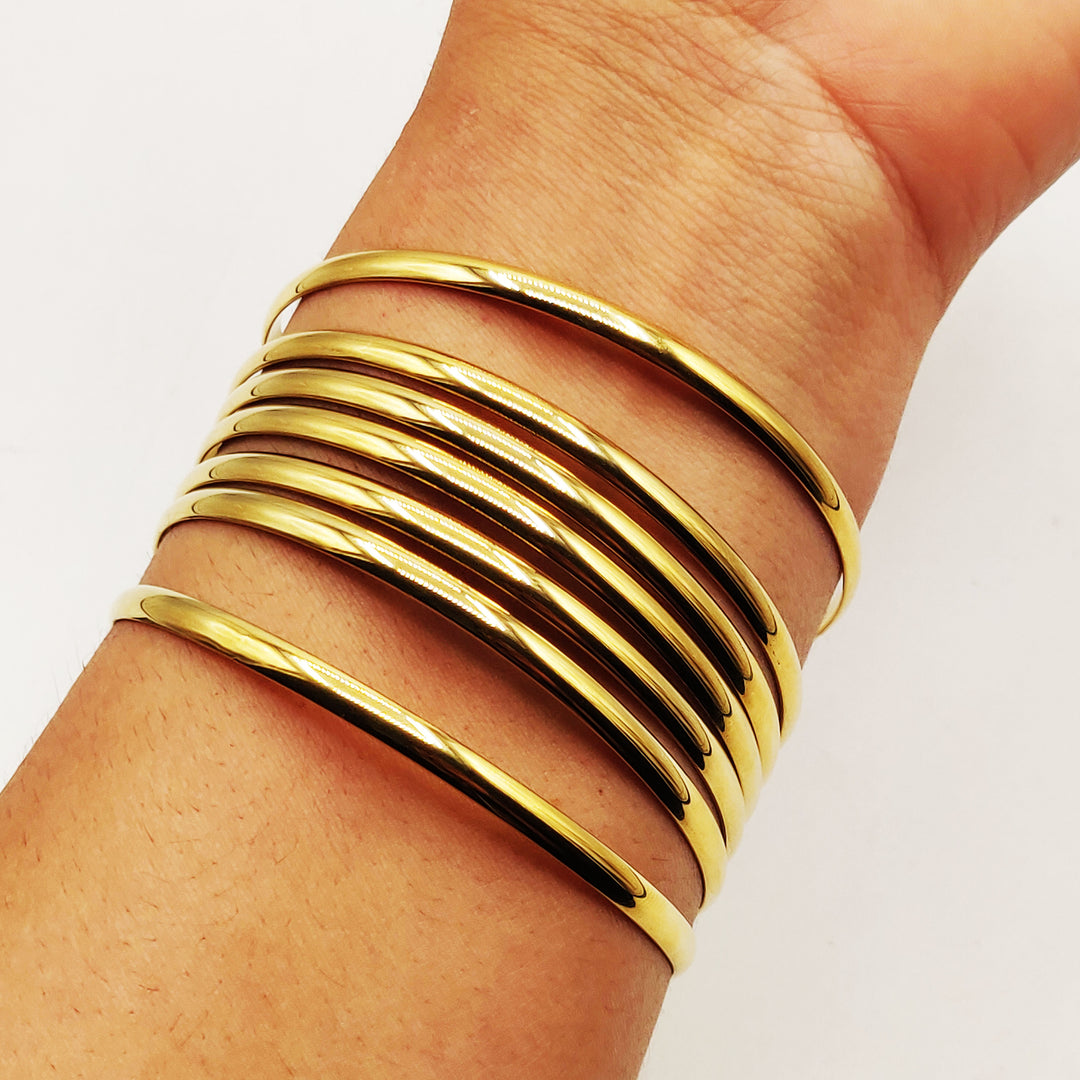 7Bracelets Rigides Arrondis Simples Doré
